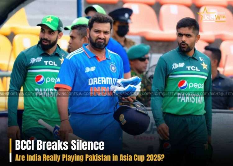 Pakistan and Indian cricket players entering the field before the start of the match