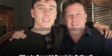 South African cricketer Dewald Brevis posing for a photo with his father