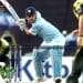 ms dhoni about to hit ball in cricket match