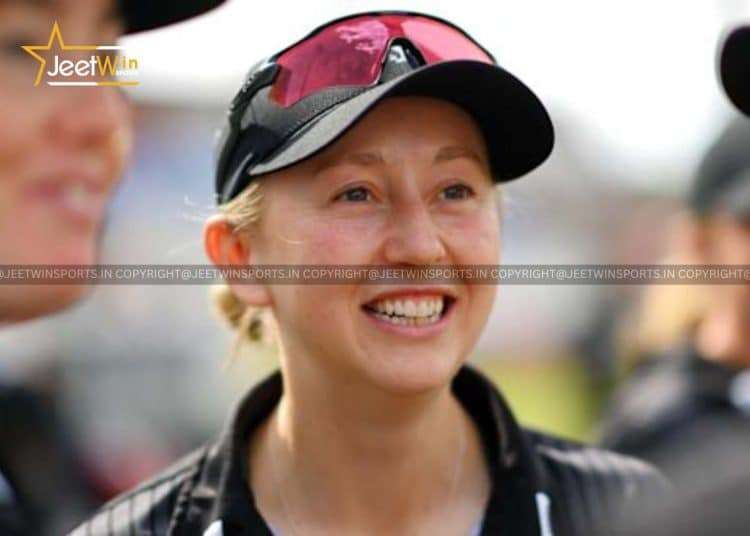Woman wearing a cap and smiling