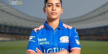 Woman cricketer posing confidently with folded arms