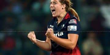 Female hockey player making a fist pump gesture